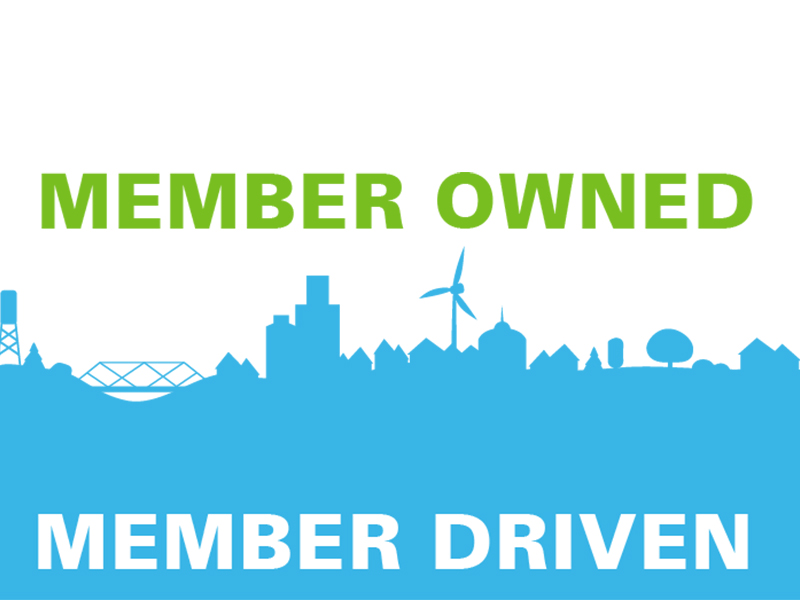 Illustration showing a cityscape with the words "Member Owned. Member Operated."